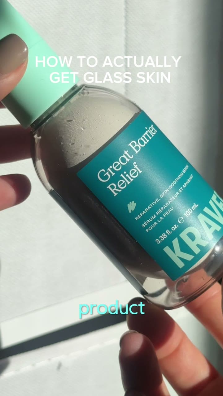 Makenna holding Krave Beauty's Great Barrier Relief serum
