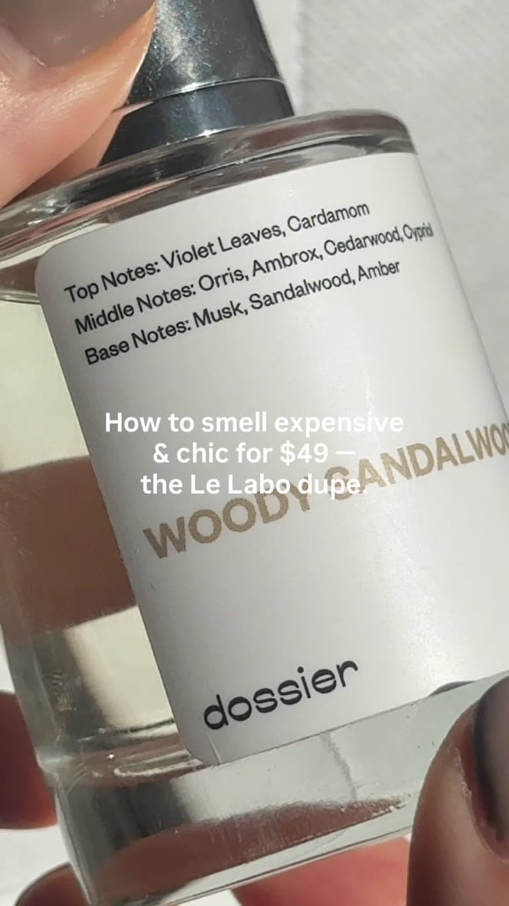 Makenna holding Dossier's Woody Sandalwood perfume, a Le Labo dupe