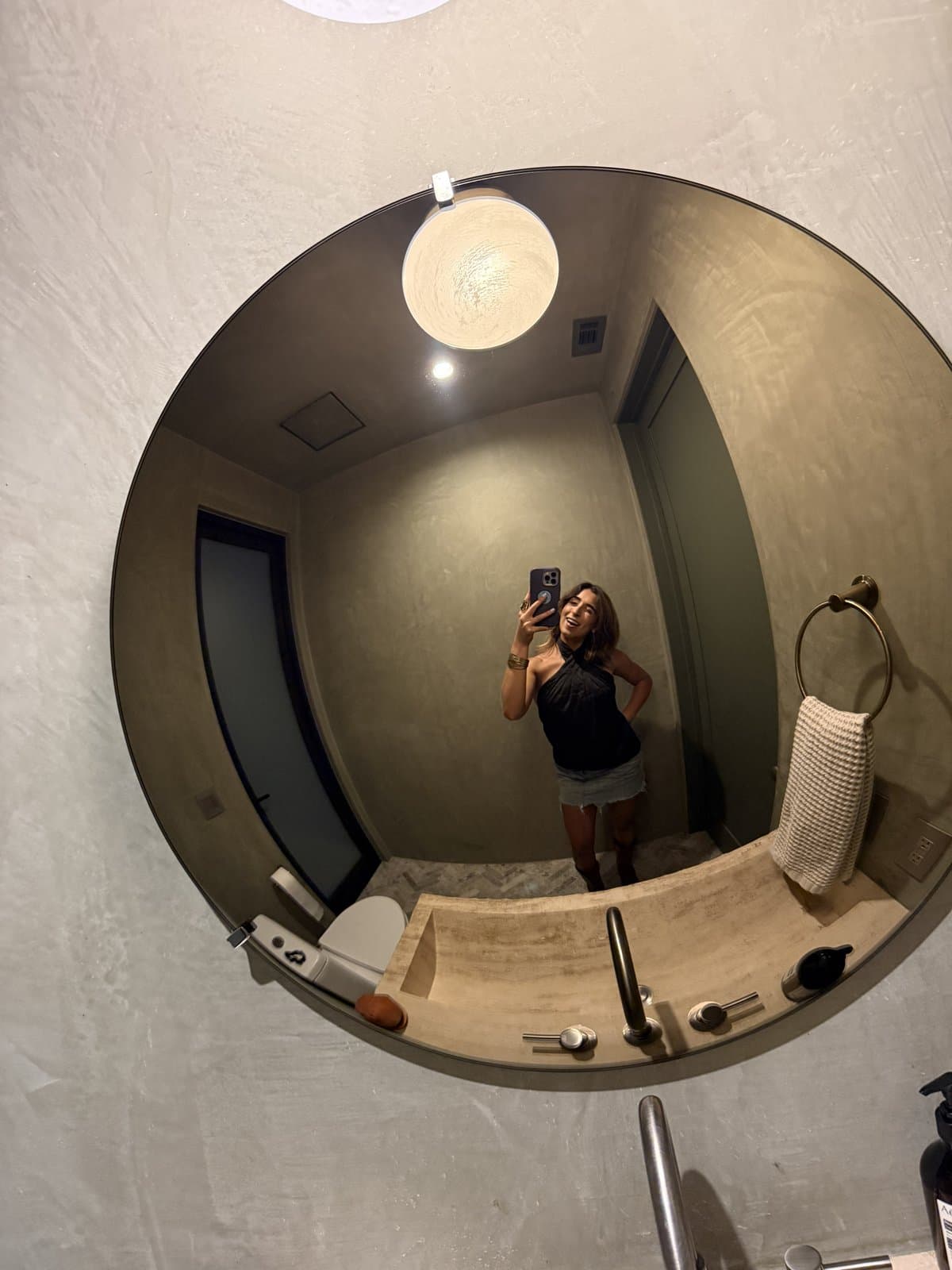 Makenna in a circular mirror selfie